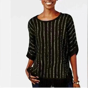 White Boho sweater with fringe. Sequin detail Dolman sleeves.